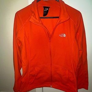 coral north face zip up